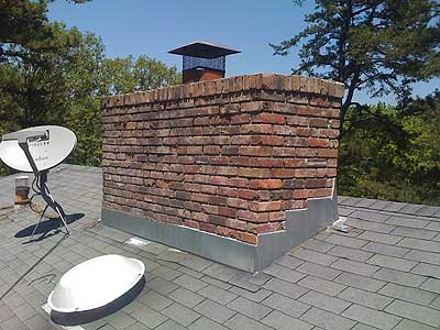 Chimney in need of flashing and shingle repair