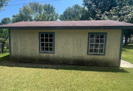 1772-before-shed-damage-left Damaged lower portion of existing exterior.