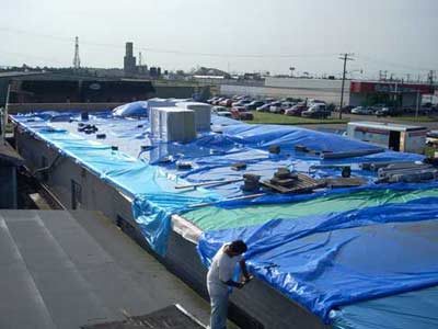 Roofs are tarped during an emergency until repairs can be made