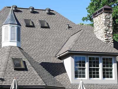 Newly installed residential roof with steep pitch